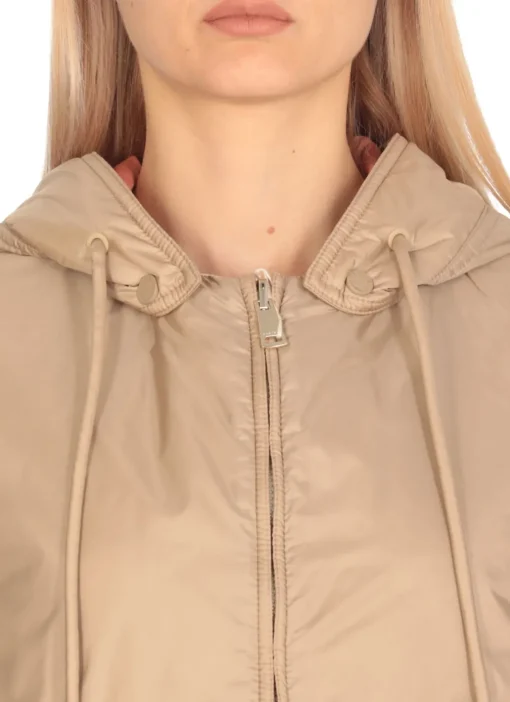Piumino smanicato reversibile